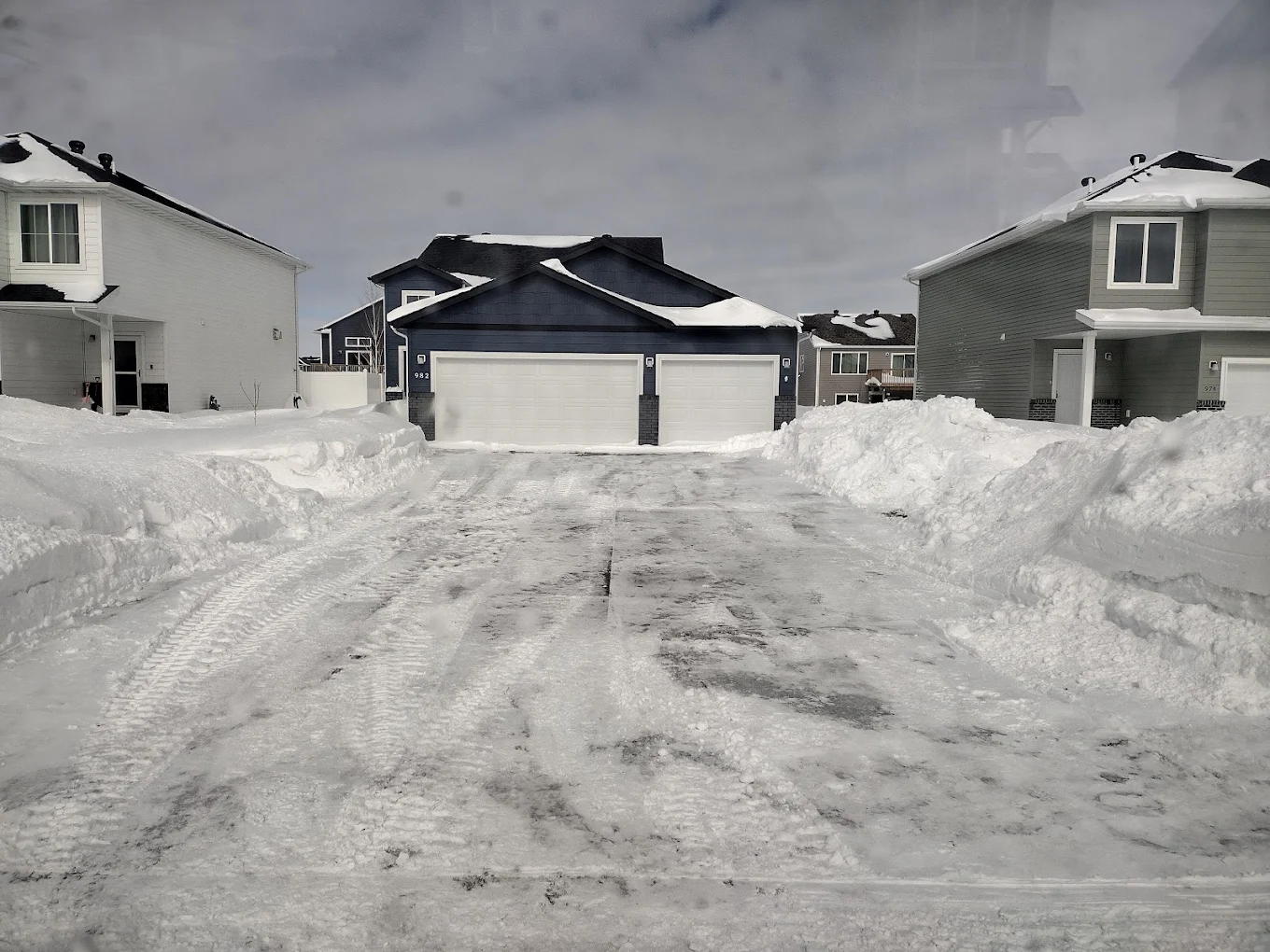 Wide driveway snow removal for residential properties in Edmonton